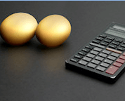 Two eggs next to calculator
